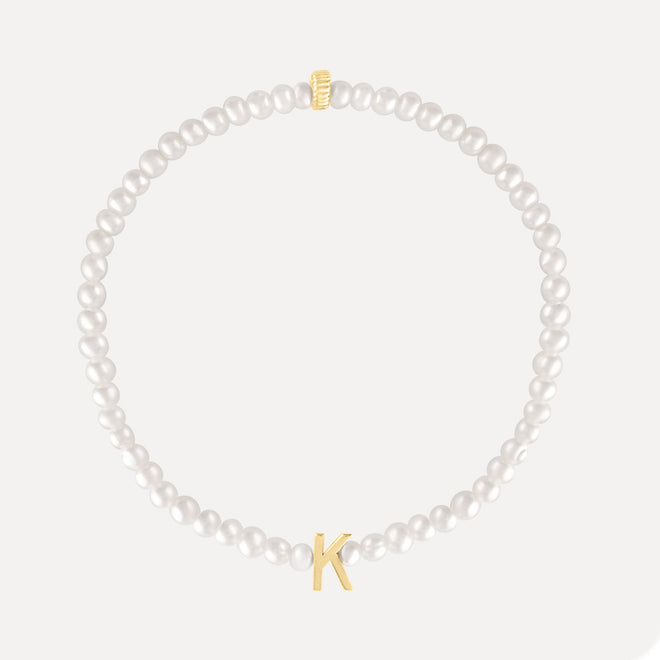 <transcy>Mini pulsera de perlas y letras</transcy>